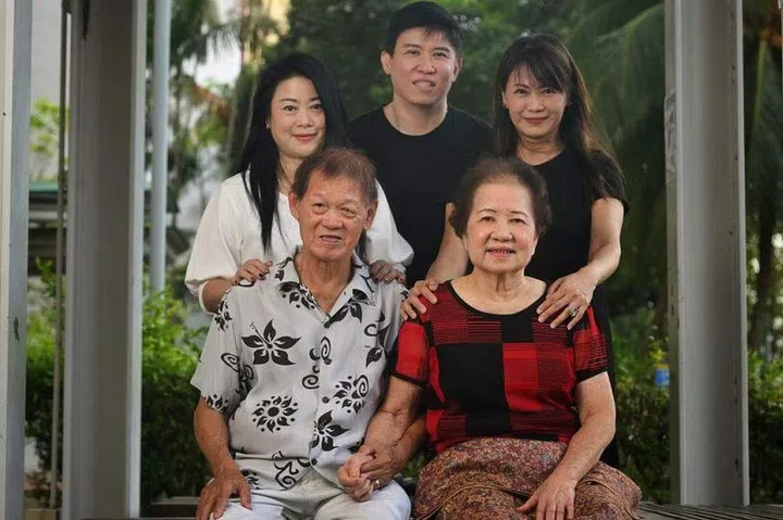 Mr Tan Chong Nam and Madam Toh Moey Lan with three of their children, (from top left) Ms Suvian Tan, 49, Mr Kevin Tan, 52, and Ms Jean Tan, 48. ST PHOTO: CHONG JUN LIANG