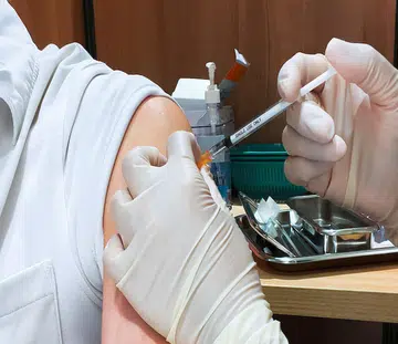 covid booster jab vaccinations status