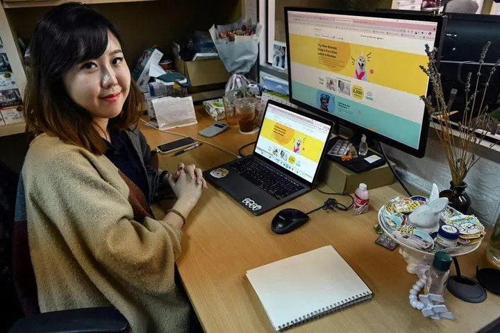 Jane at her desk. (Photo: Jane Peh)