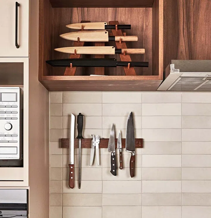 Everything has its place in the kitchen, including the husband’s knife collection and a knife rack that he crafted himself.