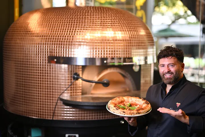 Chef Vincenzo Capuano with his Provola e Pepe pizza, 14 May 2025.