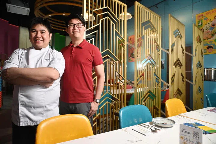 (From left) Chef Joel Ong and James Ang from Enjoy Eating House used to count on social media influencers to boost its business, but now, chef Ong creates his own content, 12 November 2024.