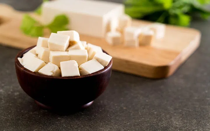 cube tofu on wooden board background