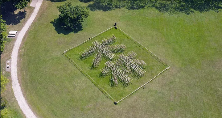 The installations are typographic in nature, and some span an entire field.