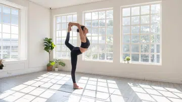 Woman doing yoga in leggings