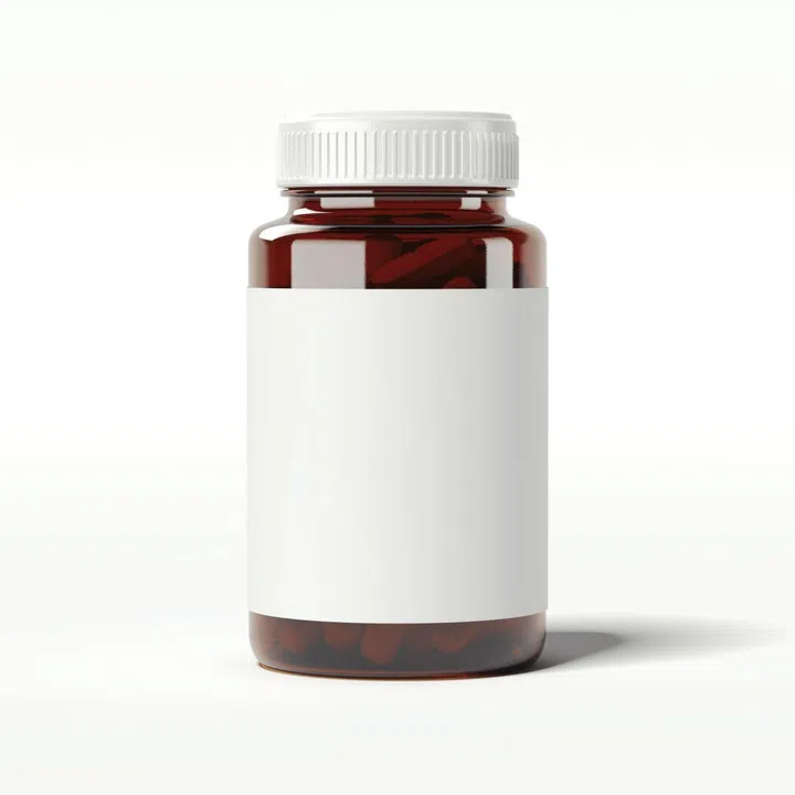 Brown bottle with pills isolated on white. 3d rendering