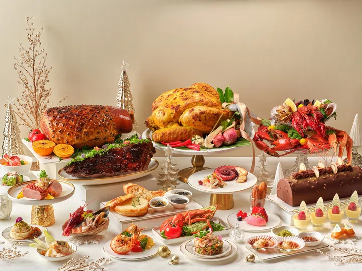 The Dining Room’s buffet highlights include its new spicy turmeric coconut turkey (background, centre).