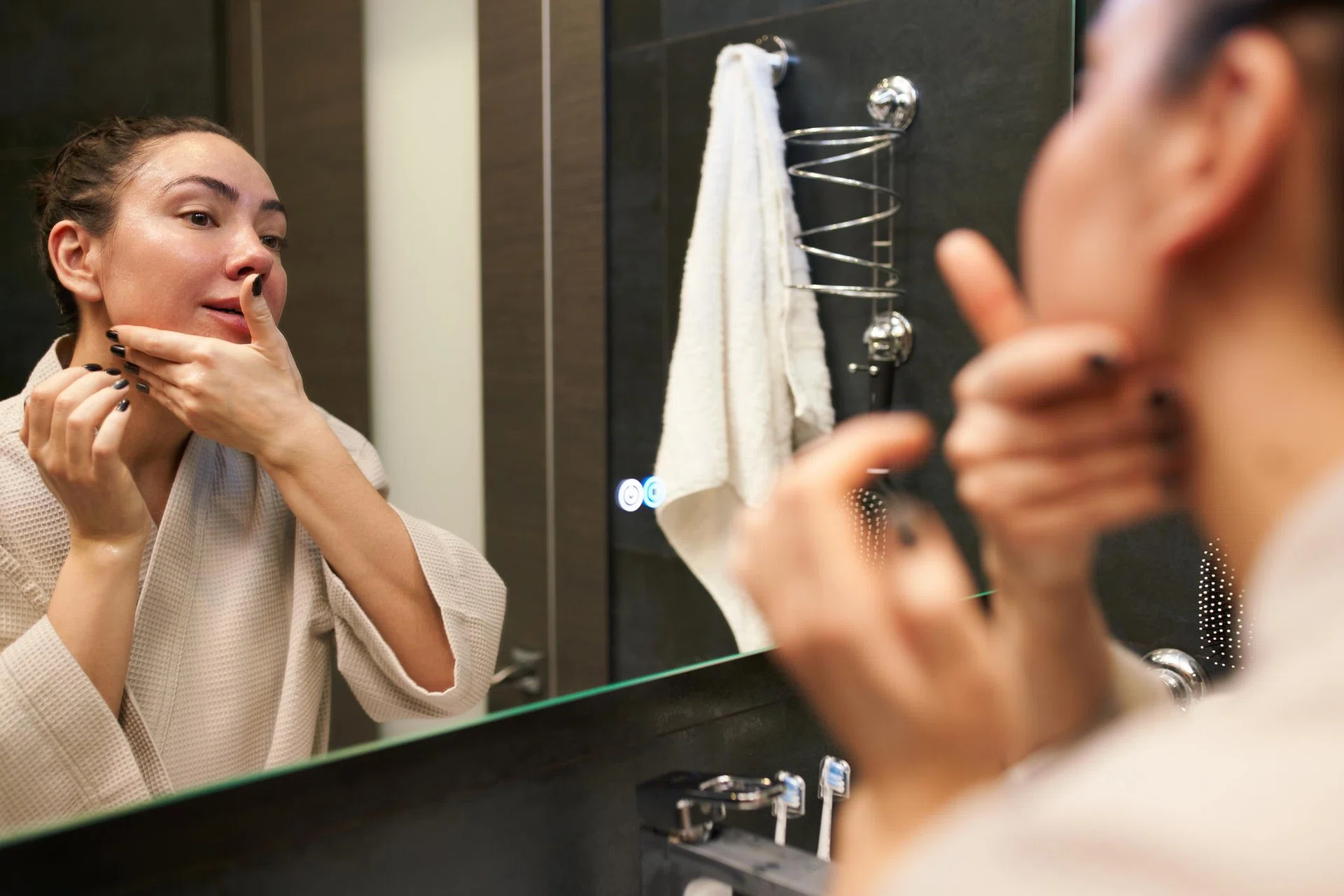 Close-up of woman receiving small face therapy massage for jawline slimming