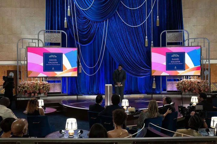 In this handout photo courtesy of AMPAS (Academy of Motion Picture Arts and Sciences) Daniel Kaluuya accepts the Oscar for Best Actor in a Supporting Role for "Judas and the Black Messiah," during the live ABC Telecast of The 93rd Oscars at Union Station in Los Angeles, on April 25, 2021. (Photo by Todd WAWRYCHUK / AMPAS / AFP) / RESTRICTED TO EDITORIAL USE - MANDATORY CREDIT "AFP PHOTO / AMPAS " - NO MARKETING - NO ADVERTISING CAMPAIGNS - DISTRIBUTED AS A SERVICE TO CLIENTS