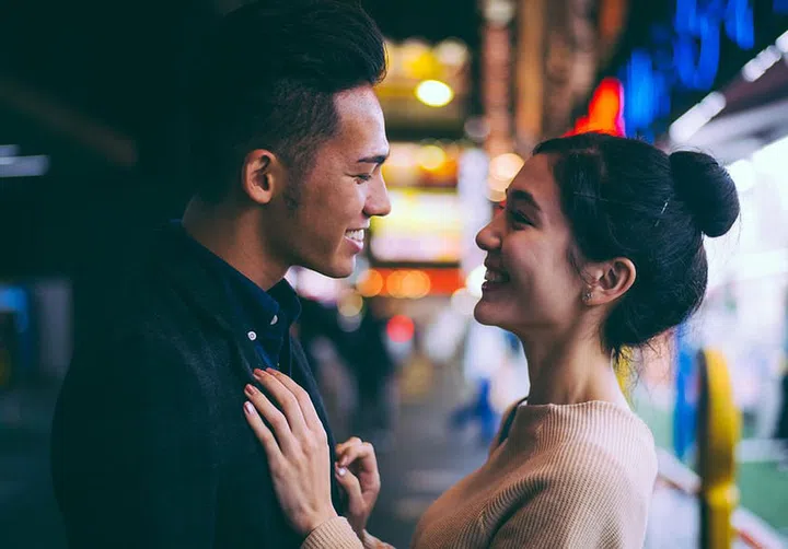 Young japanese couple spending time together in Tokyo
