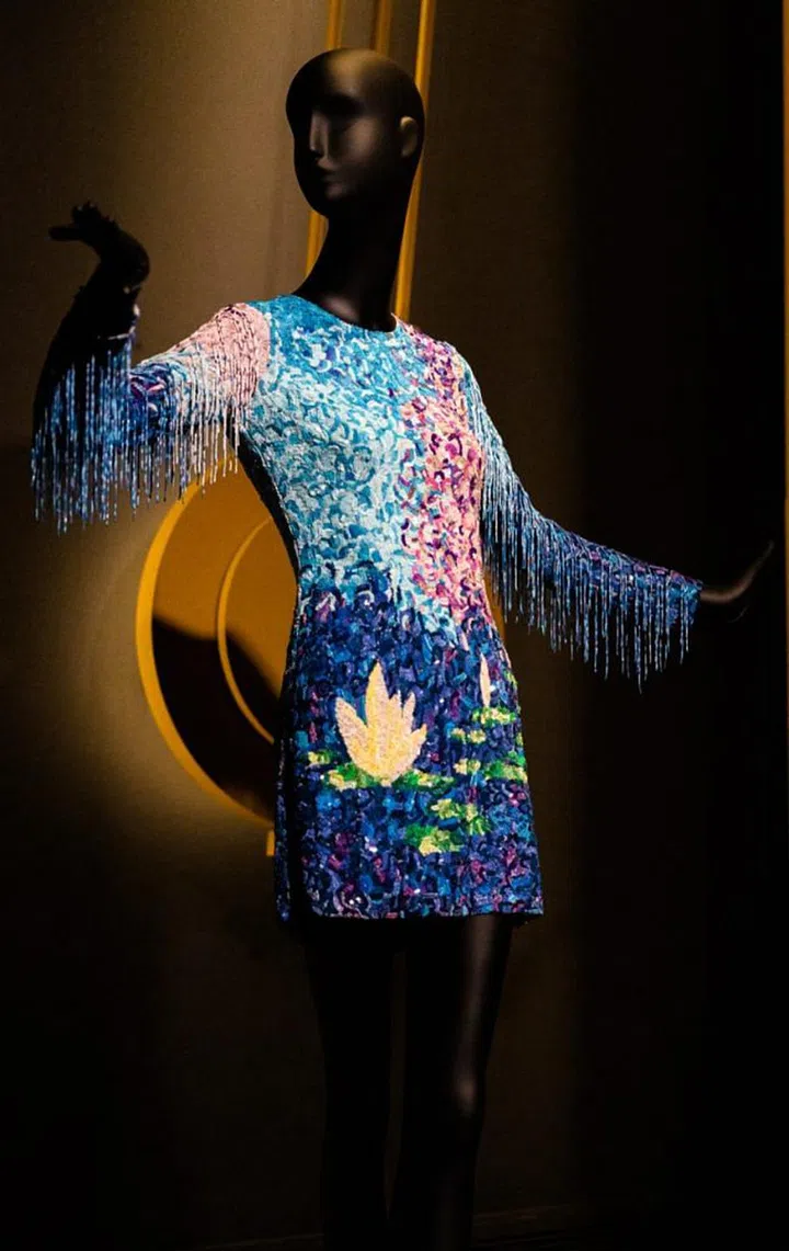A shift dress with waterlilies crafted from embroidered glass beads and sequins. Photo: Navin Pillay