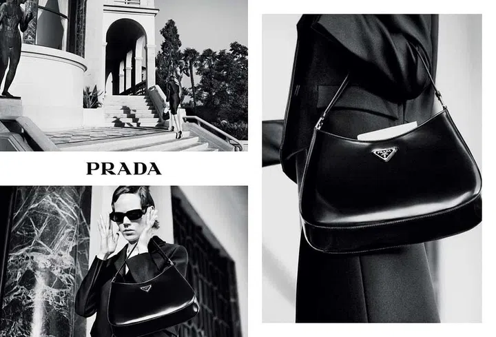 Inspired by the brand’s archival styles, Prada’s Cleo bag is made of sensuous brushed calfskin and lightweight spazzolato calf leather, and features the iconic enamel triangle logo.