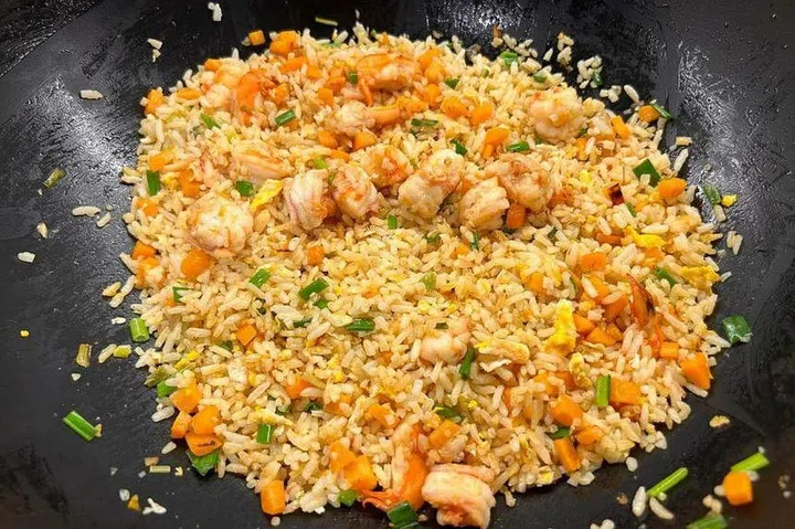 Fried rice, made without salt or soya sauce, which looks better than it tastes. ST PHOTO: CHERIE LOK