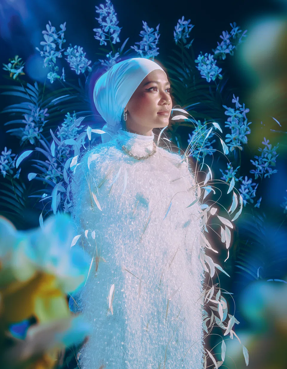 Tiffany Hardwear Graduated Link rose gold necklace with pave diamonds, and Tiffany Hardwear Large Link rose gold earrings with pave diamonds. Embellished cape with feathers, Frederick Lee Couture. Chiffon scarf, Adlina Anis 