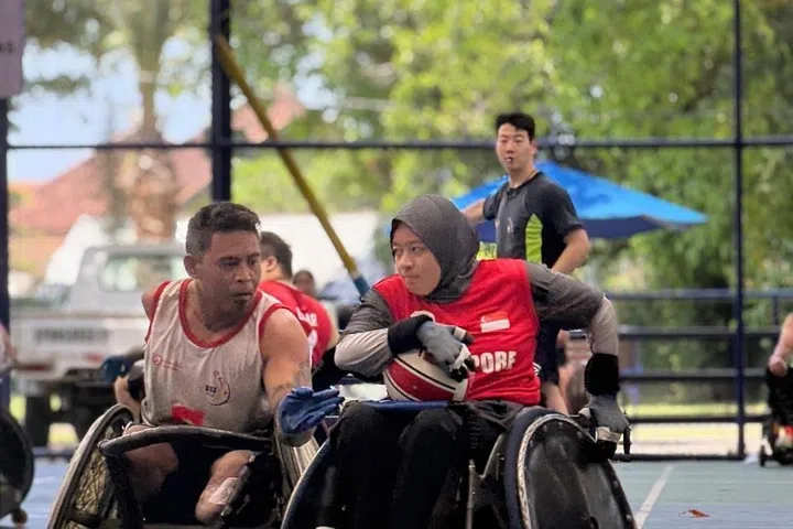 Nur Sabrina during a match of wheelchair rugby