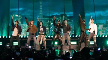 BTS Jin, Jimin, Suga, Jung Kook, V, j-hope, and RM of BTS perform onstage during the 2026 iHeartRadio Music Festival at T-Mobile Arena on September 18, 2026