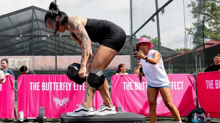 woman lifting weights