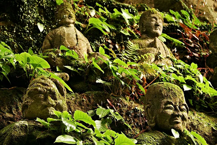 KUNISAKI, OITA, JAPAN - 2007/05/23: Named after Manjushri, wisest of the Bodhisattva, Monju Senji Temple on the Kunisaki Peninsula in Kyushu thrived as the early hub of Buddhist culture in Japan. Countless stone statues, many carved into cliffs, still survive into the present day. This area contains more than 60% of Japan's Buddhist images carved on large rock outcrops, cliffs or in caves and movable statues carved from stone. Kyushu is credited as the source of Japanese civilization, from which the seeds of culture were planted throughout the islands. Archaeological findings suggest that Kyushu was the earliest inhabited area of Japan. Records show that first contact with mainland Asia and Buddhism originated in Kyushu.. (Photo by John S Lander/LightRocket via Getty Images)