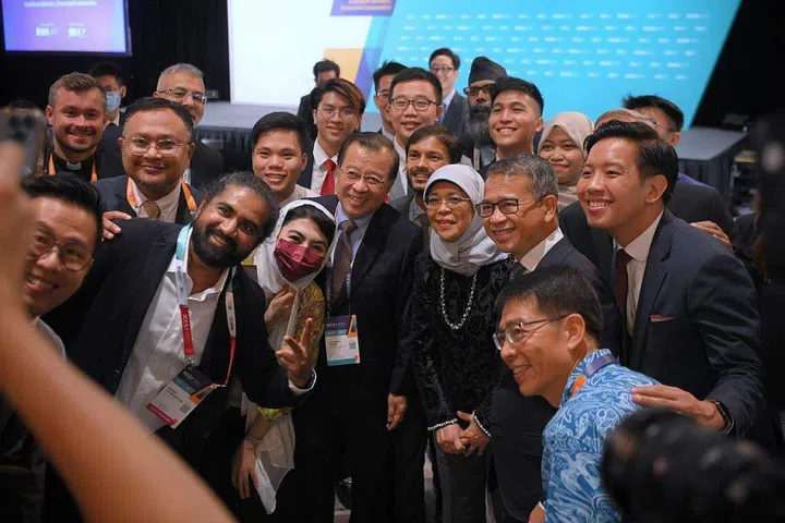 President Halimah Yacob and Minister for Culture, Community and Youth Edwin Tong with attendees at the International Conference of Cohesive Societies on Sept 6, 2022. ST PHOTO: MARK CHEONG