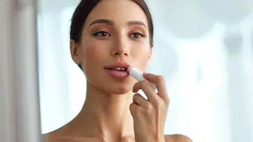 tinted lip balm travel makeup essentials