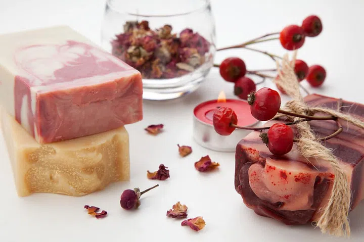 Spa set - handmade rose organic soap, dried rose flowers, and rosehips. Best suited for relaxing and health commercials.