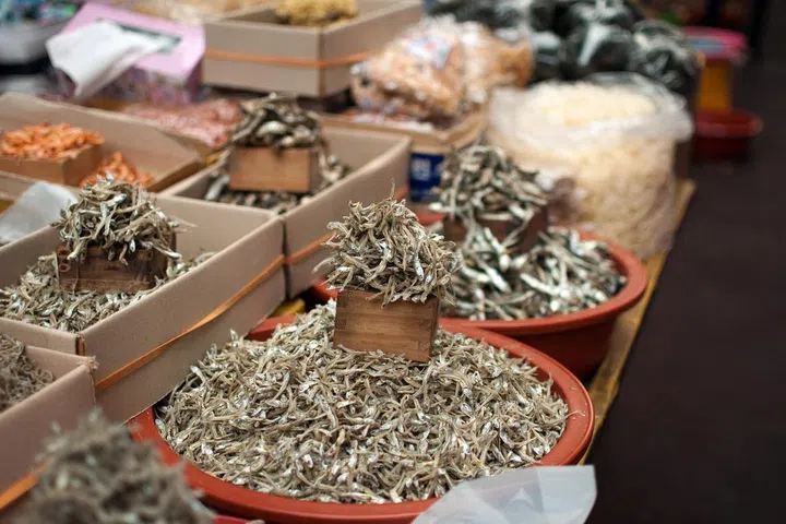 Anchovy and other variety of dried fish for sale in South Korean market.