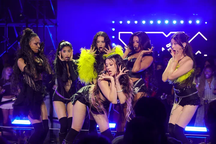 ELMONT, NEW YORK - SEPTEMBER 07: (L-R) Manon, Sophia, Daniela, Megan, Lara Raj and Yoonchae of KATSEYE perform during the 2025 MTV Video Music Awards at UBS Arena on September 07, 2025 in Elmont, New York. (Photo by Mike Coppola/Getty Images for MTV)
