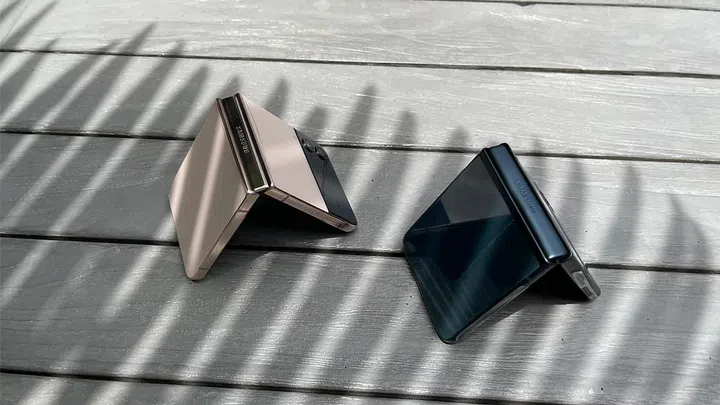 The Samsung Galaxy Z Flip 4 (left) pictured with the Z Flip 3 (right)