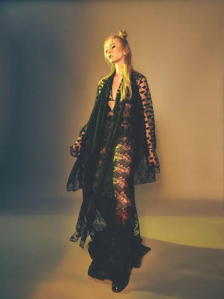 Lace maxi dress with ribbon detail and matching underwear and bralet, Fendi. Calfskin knee-high boots, Gucci