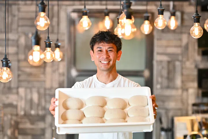 Pizza Studio Tamaki founder Tsubasa Tamaki with his pizza dough, 14 May 2025.