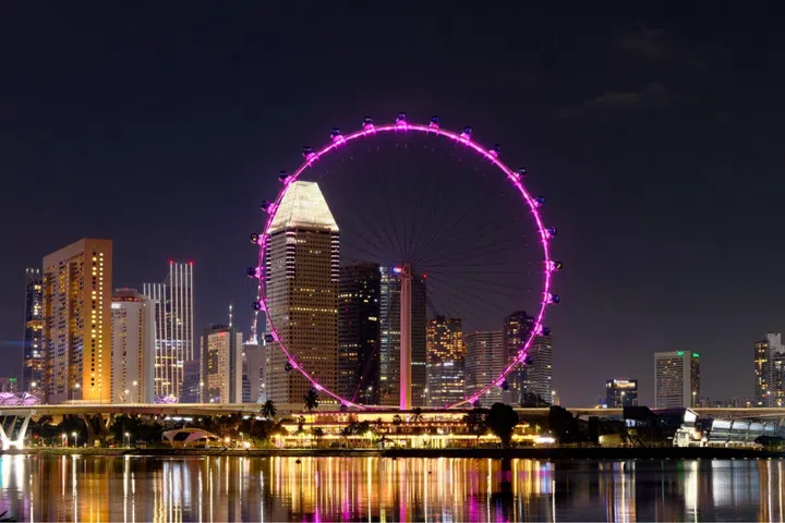 The Singapore Flyer (top) lit in pink in honour of Blackpink’s National Stadium shows.