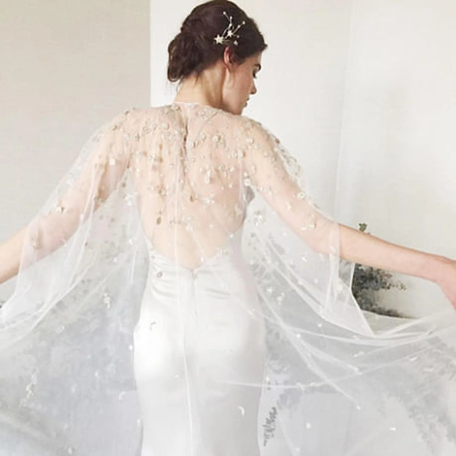 Super sheer capes, black trims and pretty bows: 3 bridal trends that'll ...