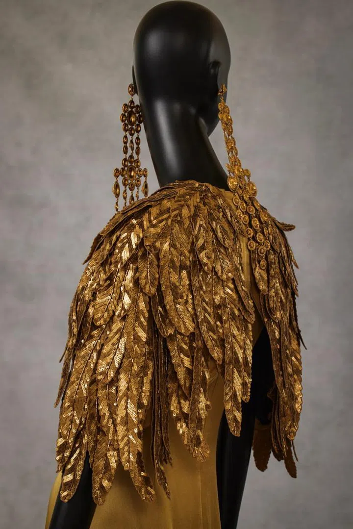 A gold cape that was worn by Carina Lau. Photo: Courtesy of Asian Civilisations Museum. Image: Lenne Chai