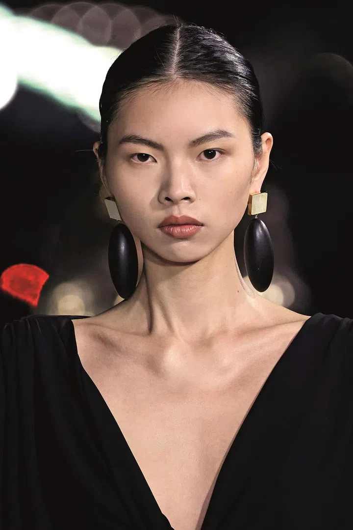 A model’s Beauty close up at Saint Laurent Spring Summer 2023 Women Ready to Wear Fashion Show on September 2022 in Paris, France