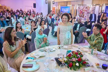 Sadhana Rai, chief representation officer and Her World Young Woman Achiever 2025; Mdm Halimah Yacob, chancellor of SUSS, former president of Singapore, and Her World Woman of The Year 2003, Anastasia Tjendri-Liew, founder of Bengawan Solo and Her World Woman of The Year 2025, Henry Liew, director of Bengawan Solo. Credit: Her World | who was spotted at the Her World Woman of the Year awards 2025