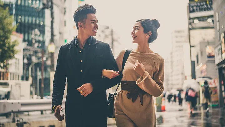Young japanese couple spending time together in Tokyo