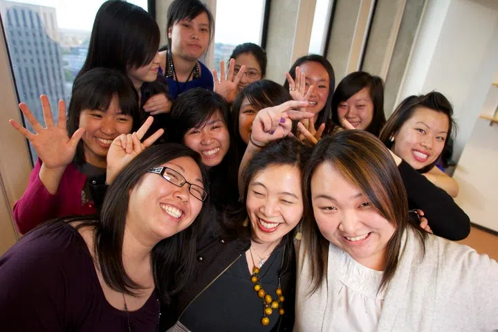 (042110  Boston, Mass.)  ASPIRE  From left, A.S.P.I.R.E. Youth Leadership Program college intern Annie Wu, Interim executive director Vienne Cheung and conference director Jane Lee work with young Asian women, providing leadership seminars and career advice. Herald Photo by KELVIN MA. Saved in Adv Fin (Photo by Kelvin Ma/MediaNews Group/Boston Herald via Getty Images)