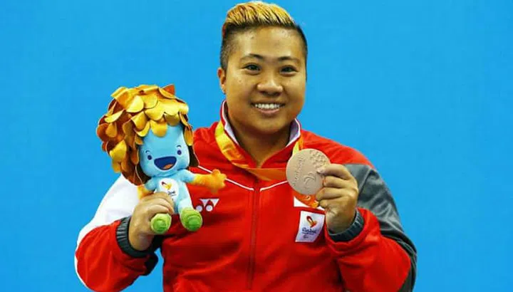 Singapore Her world young woman achiever 2005 para-swimmer Theresa Goh MEDAL
