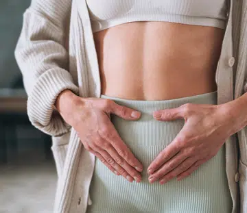 women gut health fitness bloating digestion