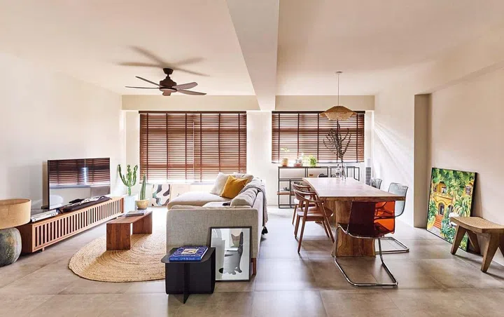 Hacking away existing bedroom walls opened up the interior and the couple now have a proper dining area to host family and friends.