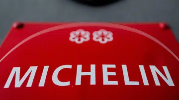 PRODUCTION - 26 June 2025, North Rhine-Westphalia, Cologne: 2 Michelin stars can be seen on a Michelin Guide plaque in front of the kitchen of Michelin-starred chef Daniel Gottschlich's restaurant "Ox & Klee". Photo: Rolf Vennenbernd/dpa (Photo by Rolf Vennenbernd/picture alliance via Getty Images)