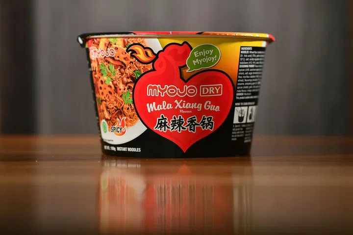 ST20200225-202048032471-Lim Yaohui/Tan Hsueh Yun/

(2nd Place) Myojo Dry Mala Xiang Guo costs $1.60. (UP $3.60)

The Sunday Times taste test on 29 types of cup noodles at Relish restaurant on Feb 25, 2020. 

Judging panel is Food Critic Wong Ah Yoke, Chef Bjorn Shen and Food Editor Tan Hsueh Yun. 

(ST PHOTO: LIM YAOHUI)