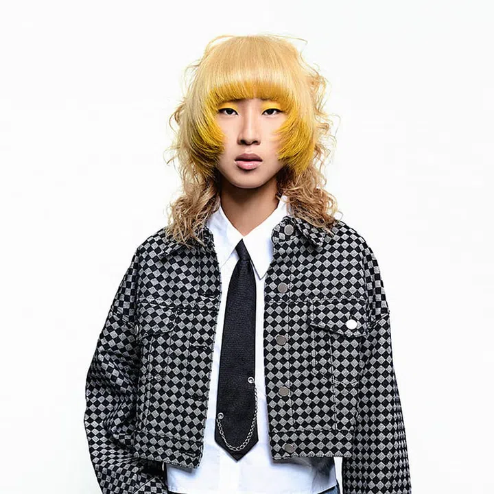 A flashy blonde look created by stylist Richard Tan from Blonde & Pastel. Wardrobe by Urban Revivo. PHOTO: RUILIANG ONG

