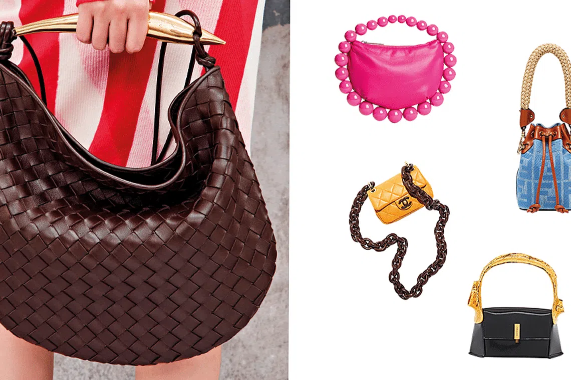 We are into this handbag trend with statement handles and slings | Her ...