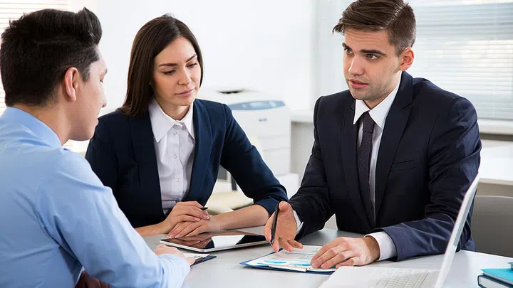 Businessman tells his colleagues about a new business project