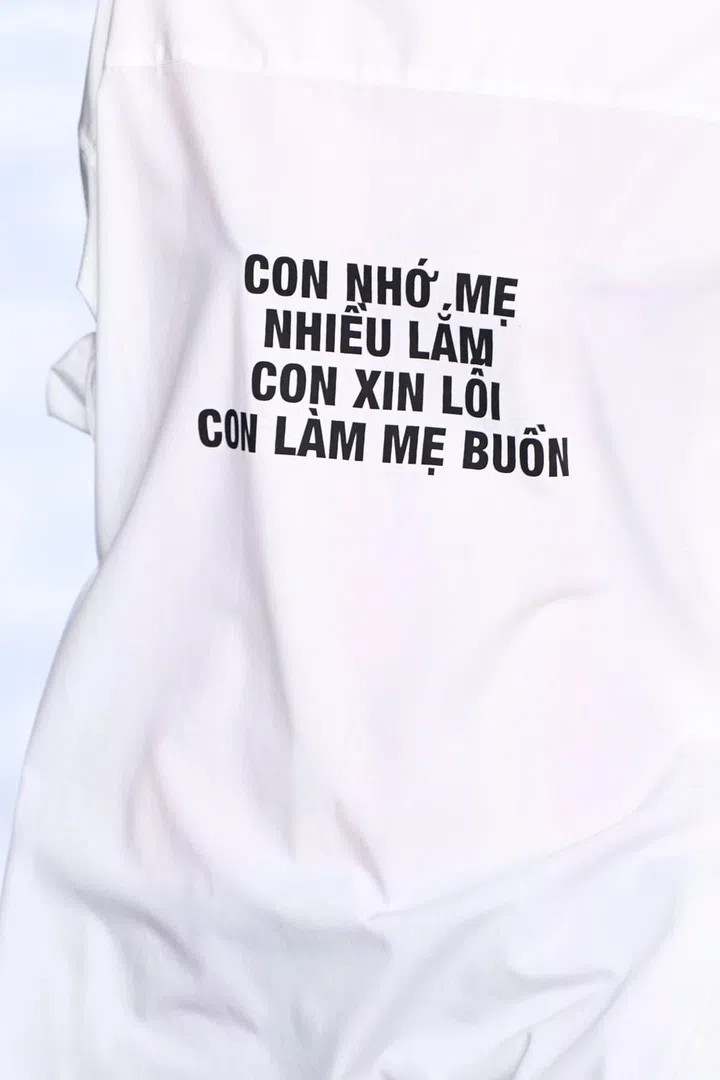 Creative director and Vietnamese designer Peter Do seamlessly integrated the poetry of Vietnamese American poet, essayist, and novelist Ocean Vuong into his inaugural runway designs for Helmut Lang. Credit: Showbit.com