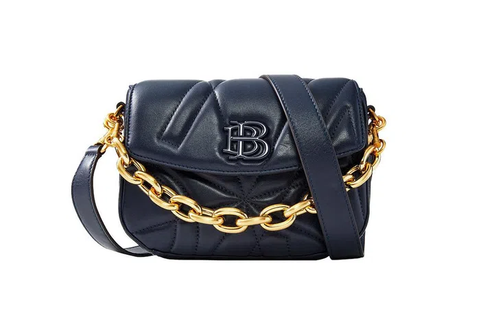 The Naiara Shoulder Bag ($395) comes in three classic colours.