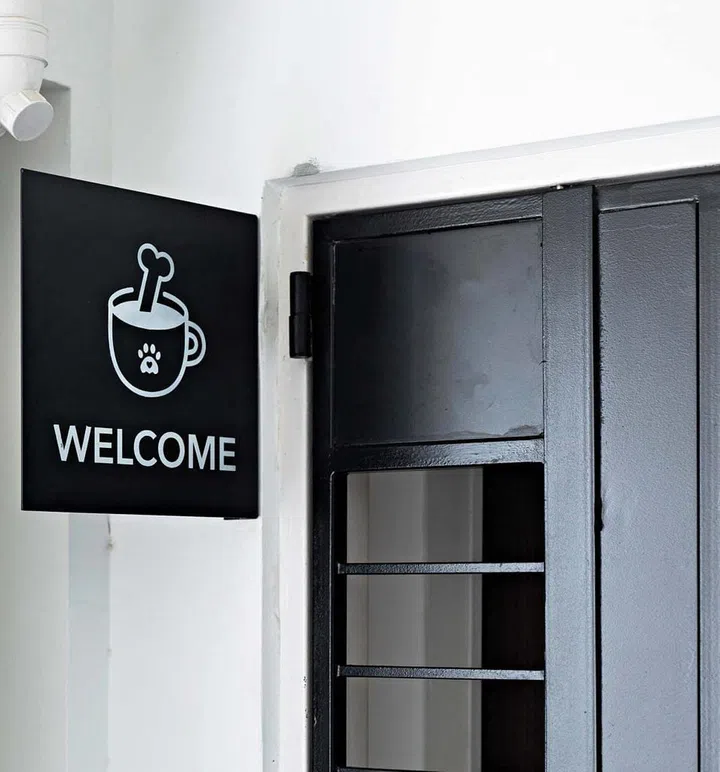 The metal signage at the entrance is part of the scene setting that took time and effort.