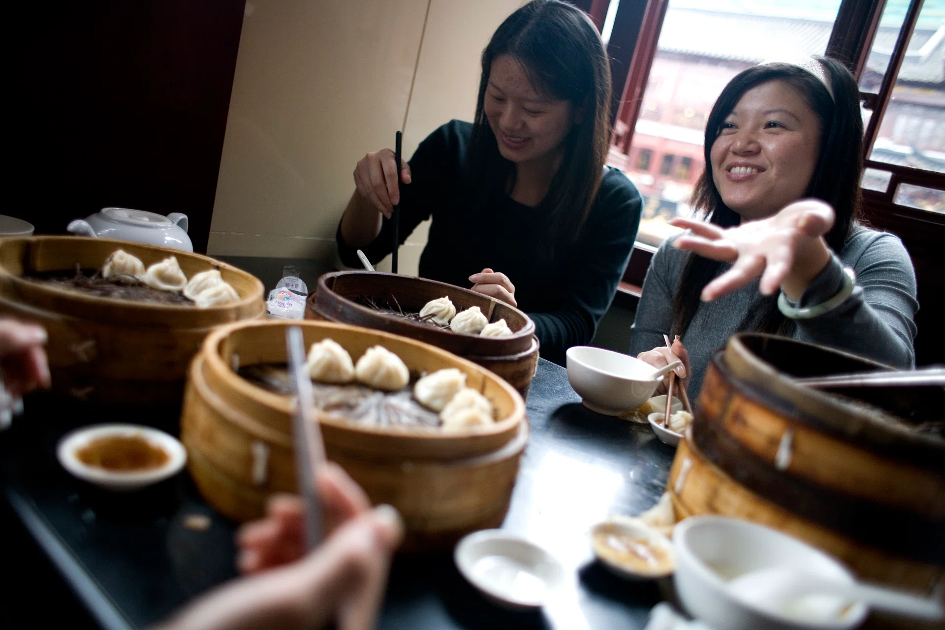 Image of women having food together