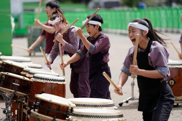 DAISEN, JAPAN - AUGUST 31: Local children play Japanese drums outside the Omagari Station before the Omagari Fireworks Festival on August 31, 2019 in Daisen, Akita, Japan. (Photo by Toru Hanai/Getty Images)